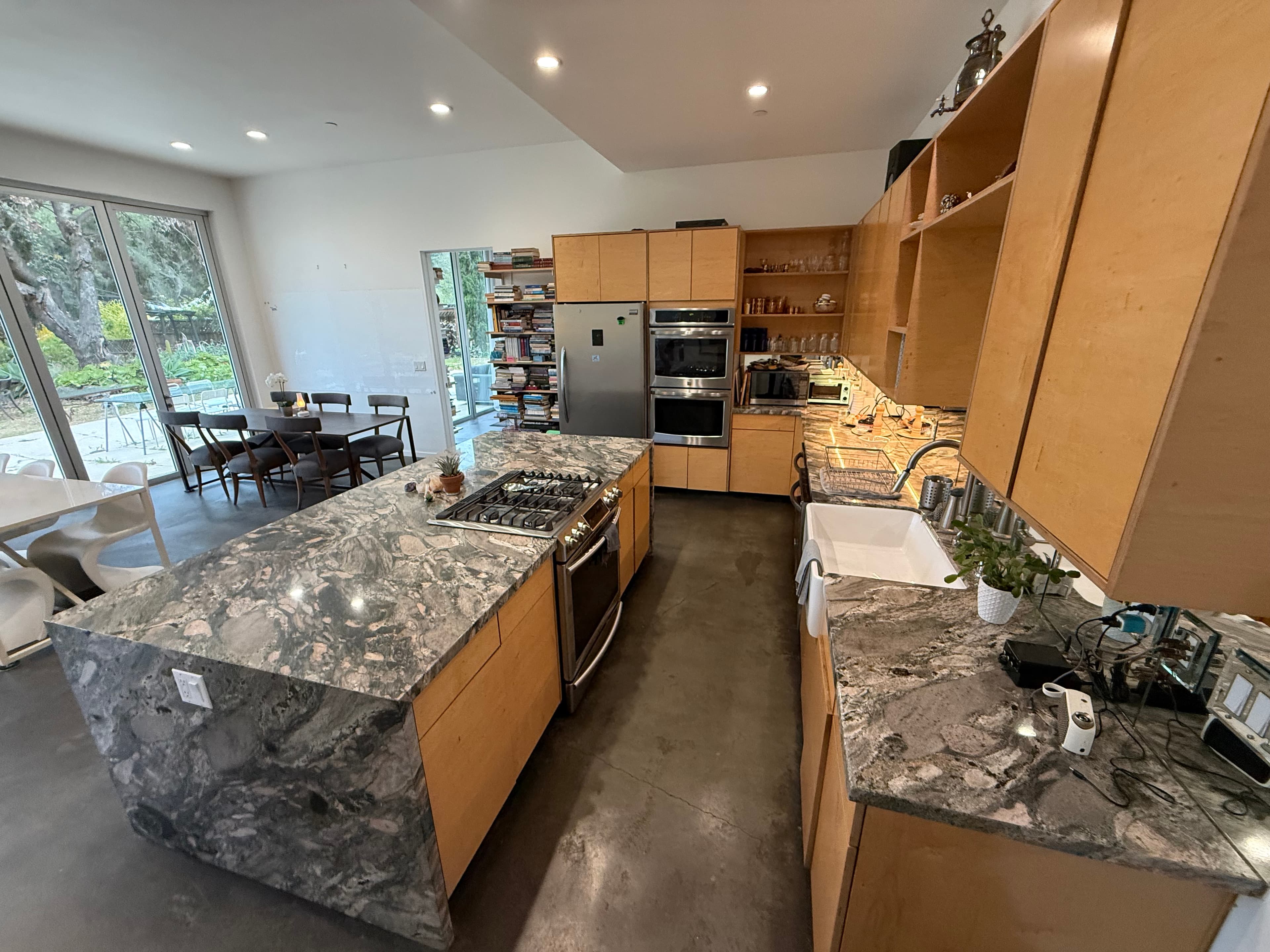 Wide daytime view of the kitchen cowork area.