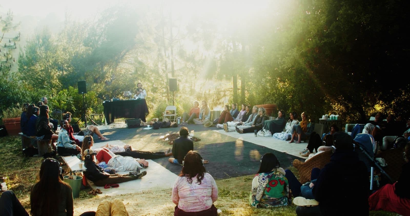 Workshop gathering in a circle at the Topanga house.