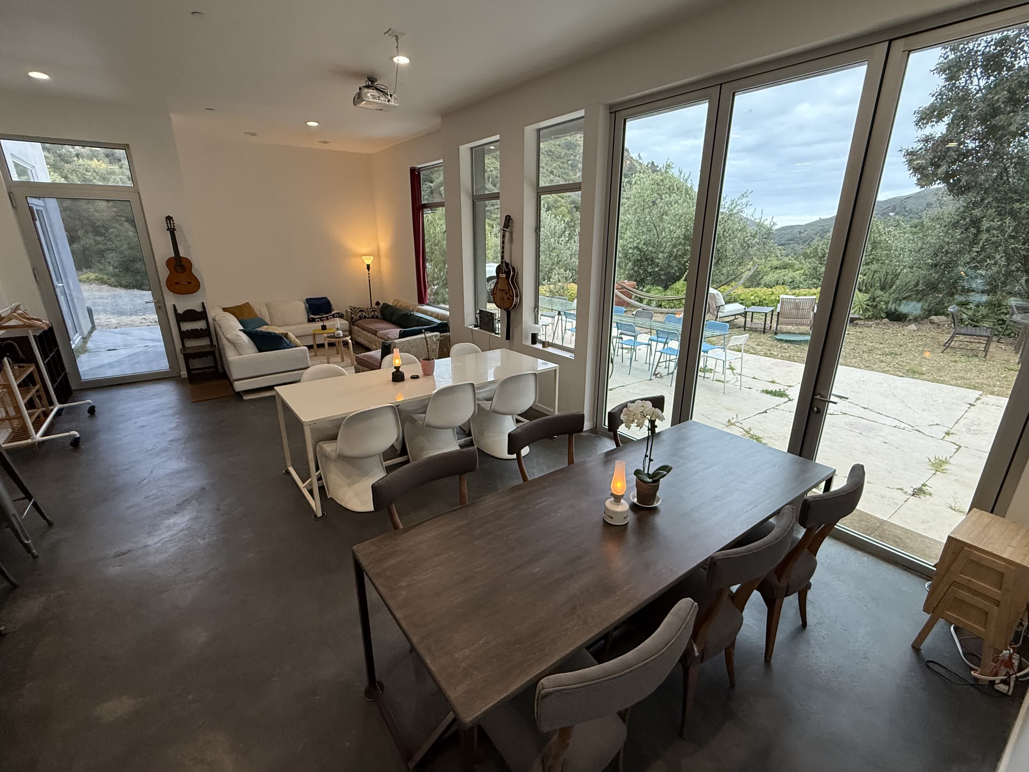 Main shared cowork area inside the Topanga house during the day.